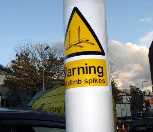 Large Warning Sign &ndash; Anti Climb Spikes &ndash; HiViz 200 x 150mm (Adhesive Flexisign) | Roller Barrier